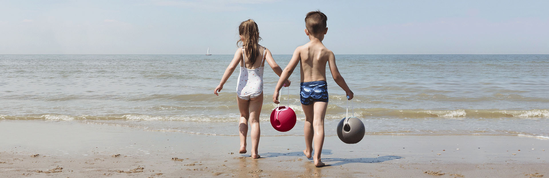 Children with baby toys enjoying outdoor activities